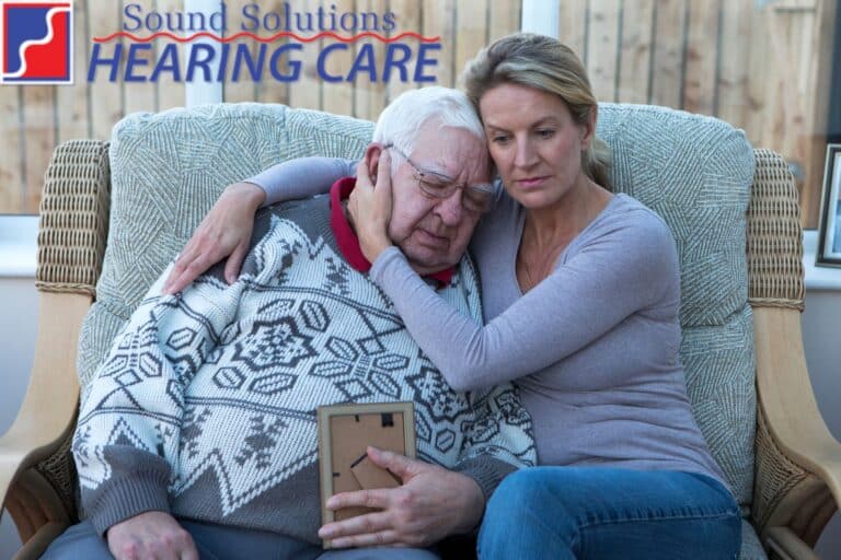 adult woman hugging her father